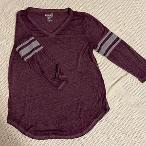 3/4 sleeve shirt. Purple with gray stripes on the sleeves.